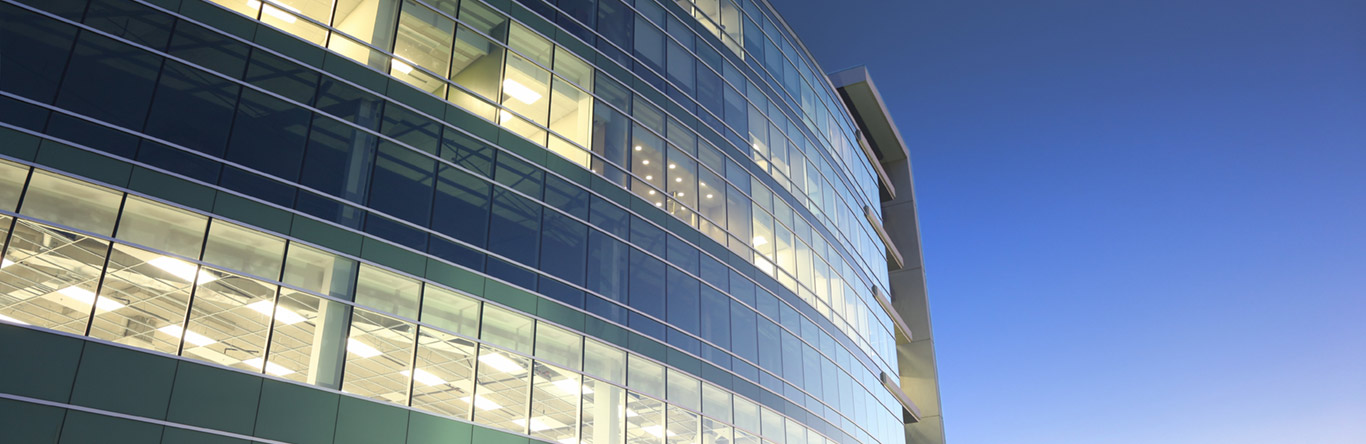 Exterior of building with interior lights on